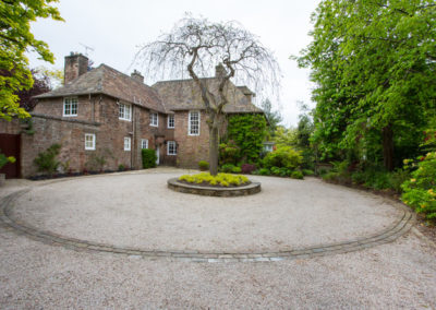 An Arts and Crafts House front garden and driveway