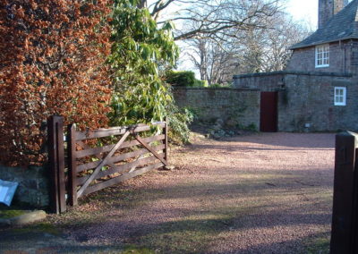 An Arts and Crafts House front garden and driveway