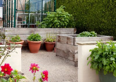 Panoramic refuge - greenhouse and raised vegetable beds